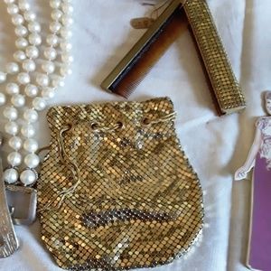 Vintage Gold purse with matching comb.